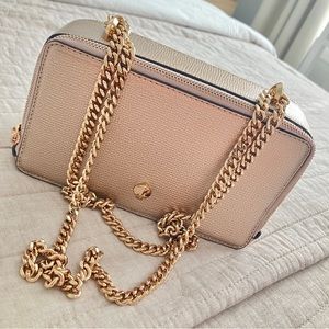 Gold Kate spade bag. May be used as shoulder or crossbody bag.